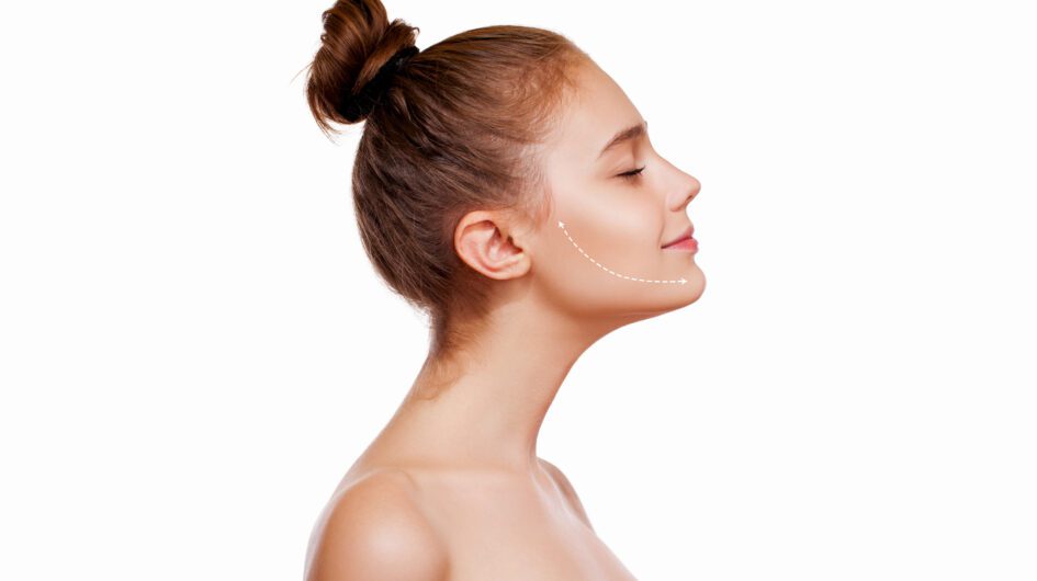 Young Girl with Brown Hair on top, closed Eyes, thick Eyebrows and Naked Shoulders at White Background, copy space, Beauty Photo, close up, Antiaging Concept, Lifting Arrows or Lines on Face